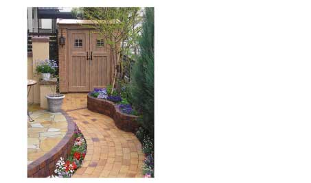 カンナ物置オレンジ設置例